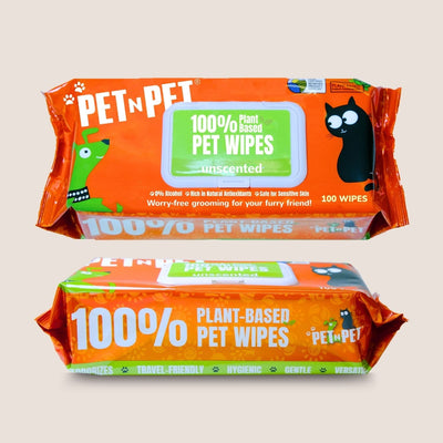 Two packages of PET N PET plant-based pet wipes on a beige background