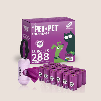 Box of PetnPet poop bags with multiple rolls on a light beige background