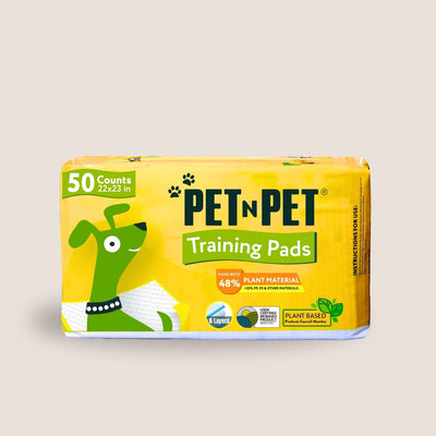 Package of Pet n Pet training pads with a yellow background