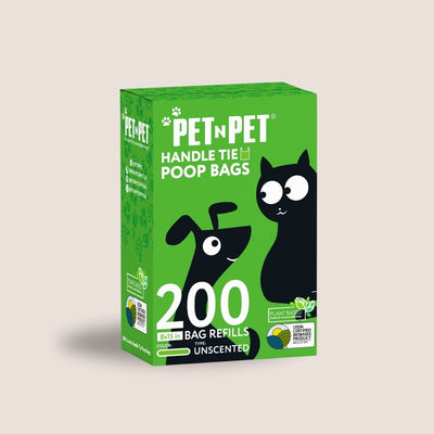 Box of Pet N Pet handle tie poop bags with cartoon dog and cat on a beige background